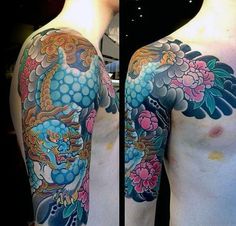 the back of a man's arm with tattoos on it and an image of a dragon