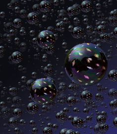 soap bubbles floating in the air on a black background with blue and purple hues