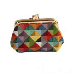 a multicolored purse on a white background