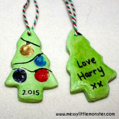 two christmas tree ornaments with the names love harry and x on them