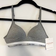 Nwt Calvin Klein Junior Grey Seamless Wireless Padded Bra. Size 30a New With Tags! From A Smoke And Pet Free Home. 20% Off A Bundle Of Two Or More Items! Free Shipping On A Bundle Of Three Or More Items. Reasonable Offers Are Always Welcome! Fitted Nursing Bra For Loungewear, Nursing Bra For Loungewear, V-neck Bra For Loungewear, Calvin Klein Seamless Sports Bra With Medium Support, Calvin Klein Underwire, Calvin Klein Stretch Seamless Sports Bra, Calvin Klein Medium Support Seamless Sports Bra, White Calvin Klein Bra, Grey Bra