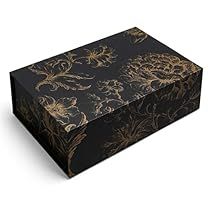 a black box with gold designs on it