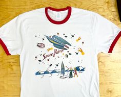 Space Patrol Shirts - Vintage Sci-Fi Shirts - Retro Sci-Fi Shirts - 50s Space Shirts - 1950s Sci-Fi Shirts - Husband Wife Tees - 1950s Shirt - 1950s Space Patrol All shirts are unisex sizing. This T-Shirt makes for a great staple t-shirt that compliments any outfit. It's made of a soft style cotton and the double-stitched neckline and sleeves give it more durability, so it can become an everyday favorite. If you have any questions, please contact us. We are happy to help! Want to see more? Visit 50s Space, Atomic Era Design, 1950s Shirts, Retro Sci Fi, Star Struck, Space Shirts, Ringer Tee, Pin Up Style, Space Design