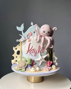 a cake with an octopus and sea animals on it