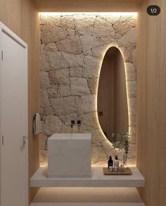 From show stopping bathtubs and sleek vanity units, to enviable bathroom decor and carefully curated accessory ideas, this gallery of images and tips has you covered. Mirror With Pebble Tilearound, Modern Spa Bathroom Stone, Spa Mirror Bathroom, Full Length Mirror For Gym, Sunken Bathroom Mirror, Concrete With Mirror, Freeform Bathroom Mirror, Bali Powder Room, Bathroom With Stone