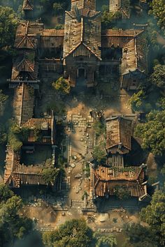 an aerial view of a village in the middle of some trees and bushes, looking down on it's roof tops