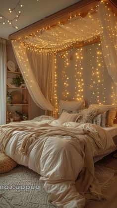 a bed with lights hanging from the ceiling and curtains over it's headboard