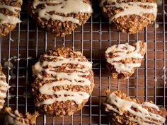 carrot muffins with icing on a cooling rack