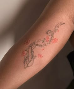 a person with a tattoo on their arm