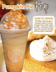 there is a pumpkin pie with whipped cream on top and a drink in the cup