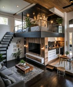 a living room filled with furniture and a fire place in the middle of a room