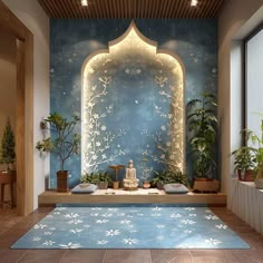 an indoor room with blue walls and white flowers on the floor, potted plants