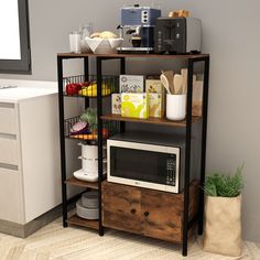 a microwave is sitting on top of a shelf