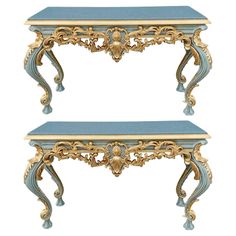 two blue and gold tables sitting side by side