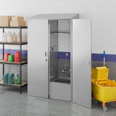 two metal storage cabinets in a warehouse with cleaning supplies