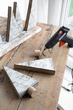 the tools are laying out on the table to be used for making woodwork pieces