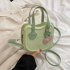 Product information: Color: White, Green, Pink Style: Street trend Material: PU Luggage trend style: crossbody bag Popular element: sewing thread Outer bag type: Inner patch bag Number of shoulder straps: single Size: 19*17*6cm/7.48*6.69*2.36in Packing list: Handbag*1pc T Shirt Crop Top, Rose Beige, Liberia, Street Trends, Mid Length Dresses, Shoulder Handbag, Sewing Thread, Botswana, Latvia