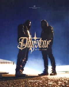 two men standing next to each other in front of a blue sky with the words dyrstar on it