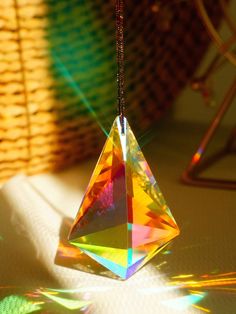 a crystal ornament sitting on top of a table