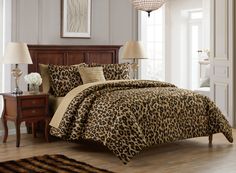 a leopard print comforter set in a bedroom