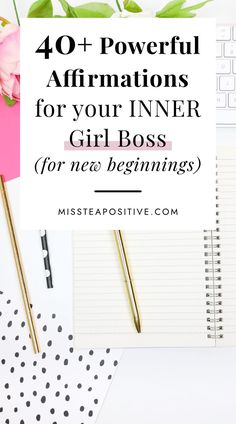 a desk with flowers, notebook and pen on it that says 40 powerful affirmationss for your inner girl boss for new beginnings