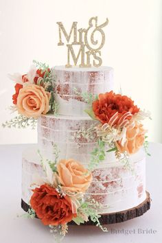 Boho naked wedding cake with burnt orange and rust flowers Wedding Cake Not Tiered, Wedding Cake 75 People, Wood Flower Wedding Cake, Fall Wedding Cakes Three Teer, Blush Pink Wedding Cake, Floral Cake Design, Wedding Cake Pearls, Rhinestone Cake Topper, Wholesale Flowers Wedding