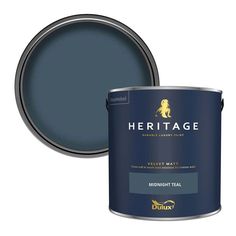 a blue paint can with the words heritage on it