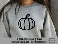 a woman wearing a gray sweatshirt with a black pumpkin on the front, and text that reads 1 image svg & png instant download - commercial use