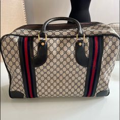 100% Authentic Gucci Duffle Bag. Worn But Well Loved. See All Pics For Bag Imperfections. Zippers Work Perfectly. No Attachment Strap (It Was Not Made For One) Inside Lining In Very Good Condition! Navy And Red With Gold Footed Embellishments. Please Look At All Photos. Gucci Overnight Bag, Gucci Travel Bag With Detachable Handle, Gucci Duffle Bag, No Attachment, Gucci Travel Bags With Gold-tone Hardware, Gucci Red Shoulder Bag With Gold-tone Hardware, Bags Gucci, Better Love, Gucci Bags