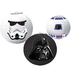 three star wars paper lanterns are shown in different shapes and sizes, one with a darth vader mask on it