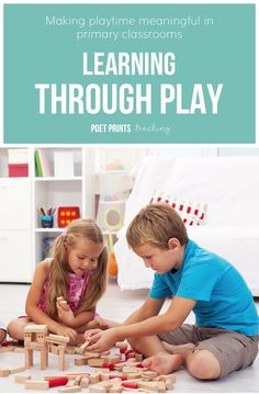 two young children playing with wooden blocks and building them on the floor in front of a book