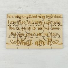 a piece of wood with writing on it that says i am sorry but very important