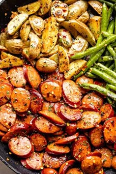 a pan filled with potatoes and green beans