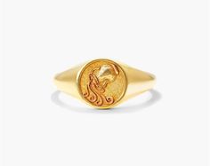 14K Yellow Gold Aquarius Zodiac Signet Ring. Aquarius is symbolized by the water bearer which represents the always abundant vessel of knowledge and intellect. Innovation and growth are also key traits which extends to those who surround it. Inspired by mythological imagery, our Zodiac Signet Ring collection is the perfect talisman to channel this energy. Symbolic Zodiac Sign Rings In Yellow Gold, Symbolic Yellow Gold Zodiac Sign Rings, Gold Zodiac Sign Rings As Gift, Symbolic Gold Zodiac Rings, Vintage Zodiac Sign Yellow Gold Jewelry, Water Bearer, Aquarius Zodiac, Ring Collections, Signet Ring