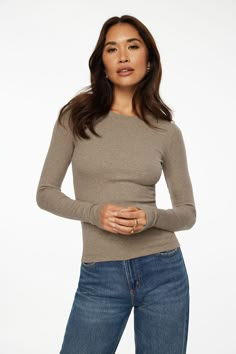 This long-sleeved crew neck tee was designed with the perfect fit in mind. This style blends organic cotton for a luxurious handfeel while subtle details elevate its blank canvas-like function. Features - Crewneck - Long sleeves - Luxurious handfeel Size & Fit - Fitted - Stretch fabric Materials & Care - 58% Organic Cotton, 38% Modal, 4% Spandex - Machine wash, cold - Imported Brown Long Sleeve Outfit, White Long Sleeve Shirts, Neutral Tops, Long Sleeve Outfits, City Outfits, Basic Long Sleeve, Crew Neck Top, Blank Canvas, New Tops