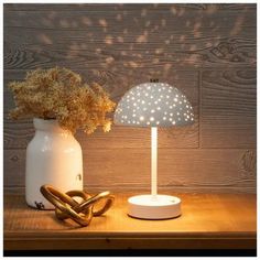 Base Dimensions: 3.88" W x 3.88" D Shade Dimensions: 3.38" H x 5.88" W x 5.88" D Full Height: 10.25" Power Source: 1 USB Power Cable Material: Metal Color: White & Gold Quantity: 1 Lamp & 1 USB Cord Illuminate your space with just a touch using this White LED Touch Lamp. This LED table lamp features a charming look with its hole cutouts on the shade and a gold finial on top. Simply touch and hold the gold sensor at the bottom to dim or brighten the warm white color. Match this miniature lamp wit Small Kids Bed, Miniature Lamp, Bed Lamp, Frame Light, Small Kids, Kids Bed, Touch Lamp, Led Table, Kids' Bed