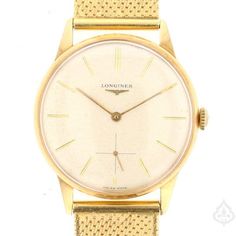 Description: Add a touch of luxury to your watch collection with this vintage 18K Longines watch. Crafted from 18K yellow gold, this watch is a true statement piece with its intricate design and attention to detail. Specifications: Metal: 18K Yellow Gold Weight: 66.7g Brand: Longines Item Code: 891250 Luxury Yellow Gold Diamond Watch For Wedding, Classic Yellow Gold Diamond Watch With Polished Finish, Classic Yellow Gold Diamond Watch With Round Dial, Luxury Gold Diamond Watch For Wedding, Classic Gold Watch With Diamond Hour Markers, Yellow Gold Diamond Watch With Round Dial For Anniversary, Anniversary Yellow Gold Diamond Watch With Round Dial, Timeless Diamond Watch With Subdials, Timeless Diamond Watch With Subdials For Wedding