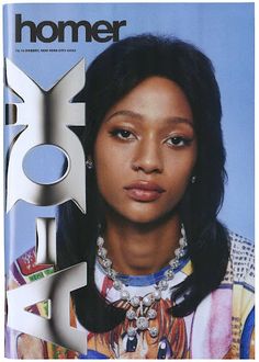 a magazine cover with an image of a woman wearing jewelry on the front and side