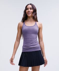 Seamless Support. This One-And-Done Yoga Tank Is Made Using Our Seamless Construction For A Smooth Fit And Features Built-In Support For A Fuss-Free Practice. Designed For Yoga. Intended To Provide Light Support For B/c Cups:slim Fit Skims Your Body:hip Length Sits Below The Waistband For Moderate, Everyday Coverage:intended For Low-Impact Activities. Built-In Shelf Bra For Added Support And Coverage. Pockets For Optional, Removable Cups. Racerback Shape Allows For Full Range Of Movement. | Ebb Ebb To Street Tank, Tank Outfit, Bra Tank, Lululemon Tank Top, Yoga Tank, Lululemon Tops, Yoga Tank Tops, Tank Top Bras, C Cup