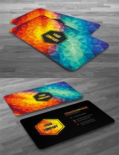 two business cards with colorful shapes on them