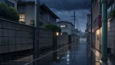 an empty street with rain falling down on it