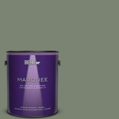 a purple paint can with the words marquee on it's bottom half