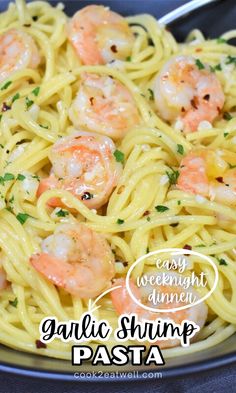 pasta with shrimp and parmesan cheese in a bowl