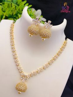 Another exclusive American diamond jhumka necklace earrings design from Indian Designs. Emerald Necklace Pendant, Silver Bridal Earrings, Pure Gold Jewellery, American Diamond Jewellery, American Diamond Necklaces, Bridal Bangles, Diamond Jewelry Necklace