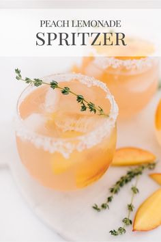 the peach lemonade spritzer is garnished with fresh herbs and served in glasses