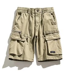 Applicable Season: summer Pattern Type: Solid Waist Type: MID Gender: MEN Closure Type: Elastic Waist Length: shorts Material: COTTON Pant Style: regular Fit Type: regular Style: Casual Decoration: Pockets Solid Color Summer Cargo Shorts For Outdoor, Khaki Bermuda Bottoms For Summer, Khaki Summer Outdoor Pants, Khaki Cargo Shorts For Summer Outdoor Activities, Khaki Cargo Shorts For Summer Beach, Summer Khaki Cargo Shorts For Outdoor, Summer Beach Cargo Shorts In Khaki, Summer Beach Khaki Cargo Shorts, Summer Cargo Pants With Multiple Pockets For Outdoor