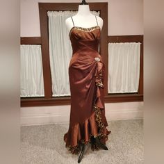 My Gowns Are Not Pre Owned. They Have Not Been Worn, Or Altered. This Gorgeous Chocolate Brown Is So Rich And Pretty. This Gown Has A Little Leopard Print Lining Peeking Out! It's Both Sophisticated And Fun. The Optional Modesty Panel Can Be Worn Beneath The Laces. Size 14 Measures: Bust 39.5"-40.5" Waist 33"-34" Hips 40" The Lace Up Back Allows You To Loosen Or Tighten The Bust And Waist A Little. Make Sure The Hip Measurement Is Accurate. It Has The Designer Hangtag And All Inside Labels Are I Brown Satin Maxi Dress For Evening, Formal Brown Satin Maxi Dress, Fitted Sleeveless Satin Mother Of The Bride Dress, Glamorous Fitted Satin Mother Of The Bride Dress, Glamorous Fitted Ball Gown For Mother Of The Bride, Fitted Ball Gown For Evening, Brown Floor-length Wedding Dress, Vintage Fitted Gown For Evening Dress, Vintage Fitted Gown For Evening Occasions