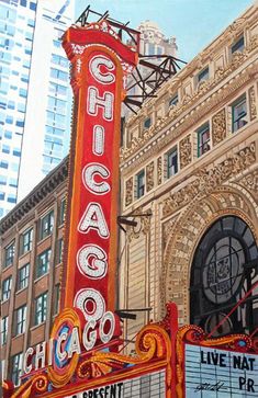 the chicago theater marquee is painted red and yellow