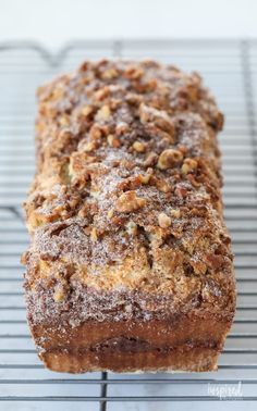 a loaf of bread sitting on top of a cooling rack