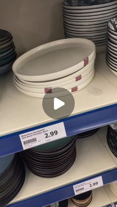 a shelf with plates and bowls on it in a store display case for $ 29 99